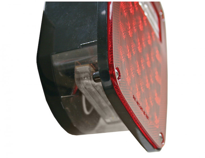 Image of Driver Side 5.75 Inch Red Stop/Turn/Tail Light with License Plate Light from Buyers Products. Part number: 5626738